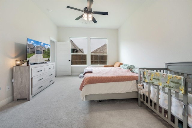 bedroom with carpet flooring and a ceiling fan