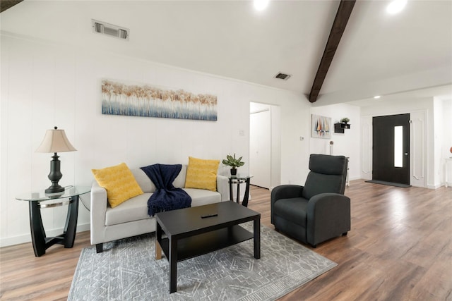 living room featuring visible vents, recessed lighting, wood finished floors, and beam ceiling
