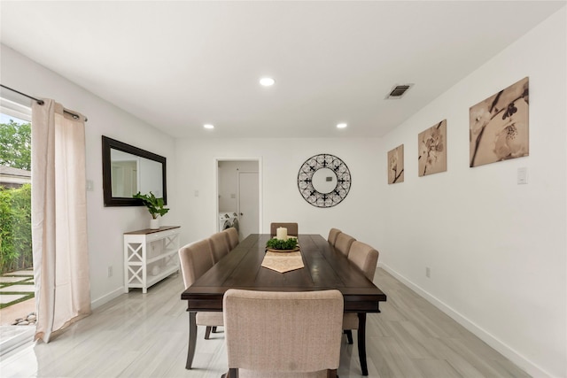 dining space featuring recessed lighting, baseboards, visible vents, and light wood-type flooring