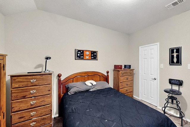 11800 Bexley Dr, Burleson, TX 76028 - bedroom featuring baseboards, lofted ceiling, and dark carpet