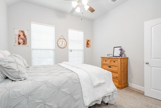 426 Norbury Dr, Rockwall, TX 75032 - bedroom with a ceiling fan, visible vents, baseboards, lofted ceiling, and light carpet