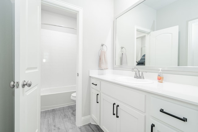 426 Norbury Dr, Rockwall, TX 75032 - bathroom featuring toilet, bathing tub / shower combination, and vanity