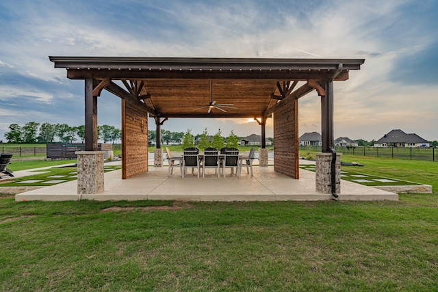 426 Norbury Dr, Rockwall, TX 75032 - surrounding community featuring a lawn, fence, and a patio