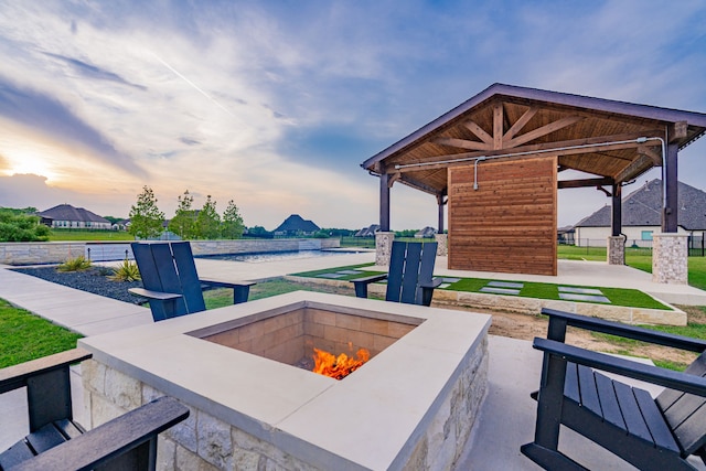 426 Norbury Dr, Rockwall, TX 75032 - view of patio / terrace with a fire pit