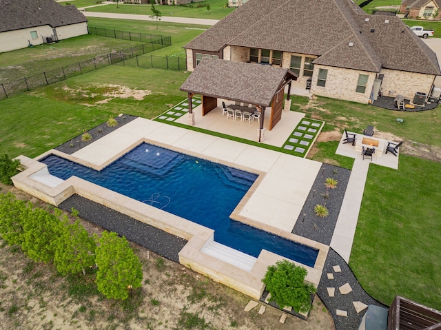 426 Norbury Dr, Rockwall, TX 75032 - view of swimming pool with an outdoor living space, a patio area, a lawn, and outdoor dry bar