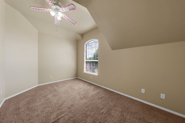 bonus room featuring a ceiling fan, baseboards, vaulted ceiling, and carpet
