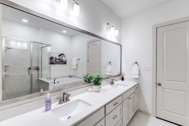 full bathroom featuring a sink, a bath, tile patterned floors, and a shower stall