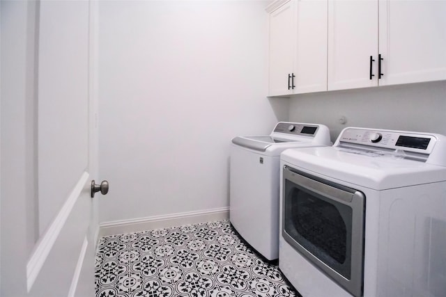 3720 Coldstream Dr, Irving, TX 75063 - laundry room with cabinet space, baseboards, and washing machine and dryer