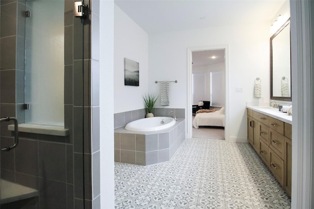 3720 Coldstream Dr, Irving, TX 75063 - full bath with vanity, a stall shower, connected bathroom, and a relaxing tiled tub