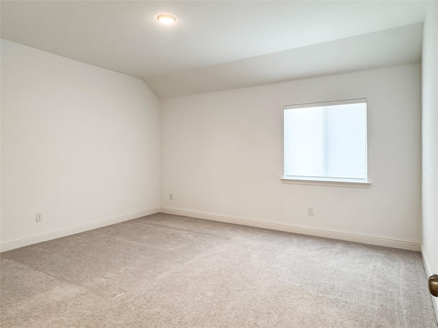 3720 Coldstream Dr, Irving, TX 75063 - unfurnished room featuring carpet flooring, baseboards, and lofted ceiling