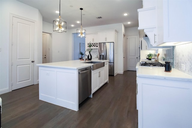 3720 Coldstream Dr, Irving, TX 75063 - kitchen featuring dark wood-type flooring, a sink, white cabinetry, and appliances with stainless steel finishes