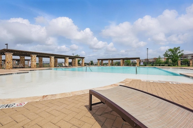 pool with a patio area