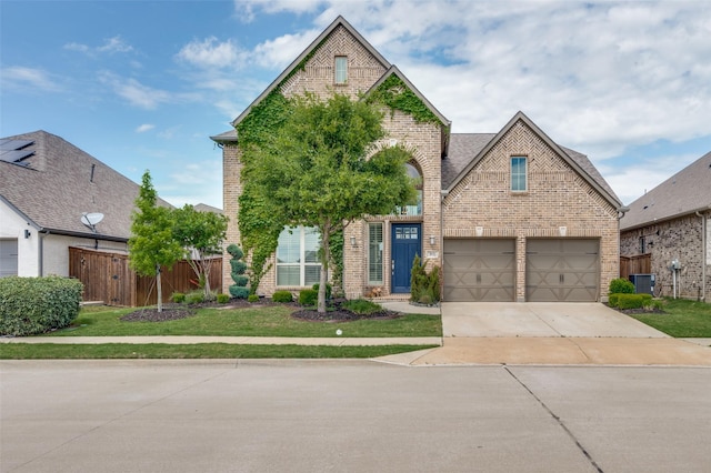 traditional-style home featuring brick siding, cooling unit, and driveway