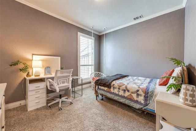 bedroom with crown molding, baseboards, carpet, and visible vents