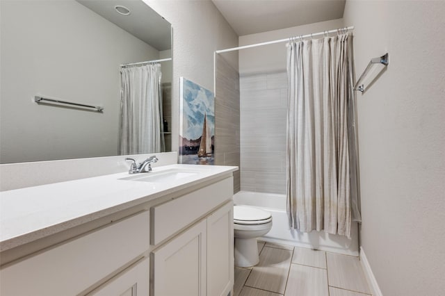 full bathroom featuring toilet, a textured wall, shower / bath combination with curtain, and vanity