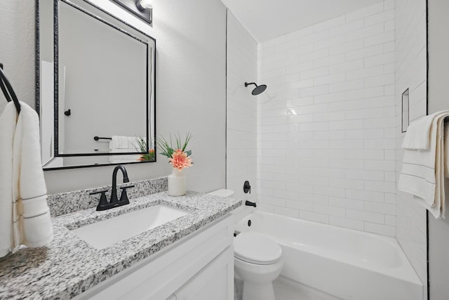 full bath featuring toilet, shower / bathing tub combination, and vanity