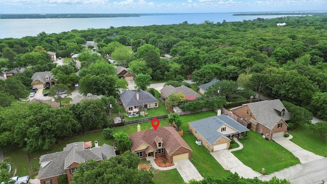 bird's eye view with a water view and a residential view
