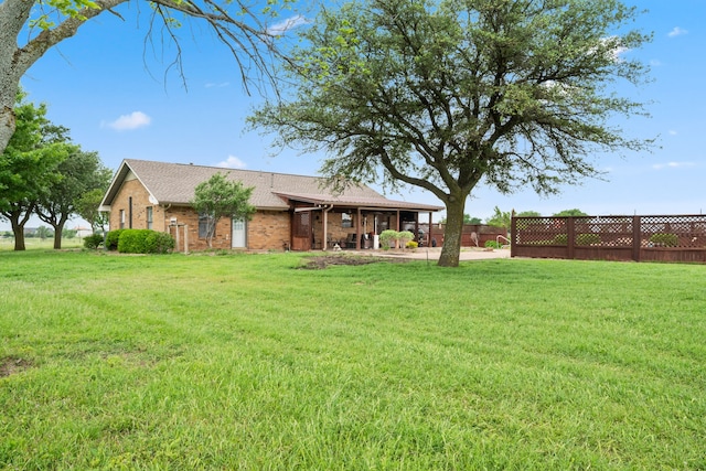 view of yard with fence