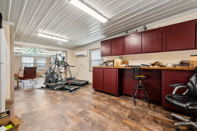 exercise room with a wall unit AC