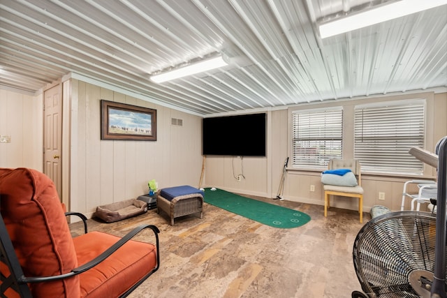 sitting room featuring visible vents and baseboards