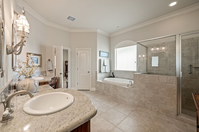 full bathroom featuring tile patterned flooring, ornamental molding, a bath, and a shower stall