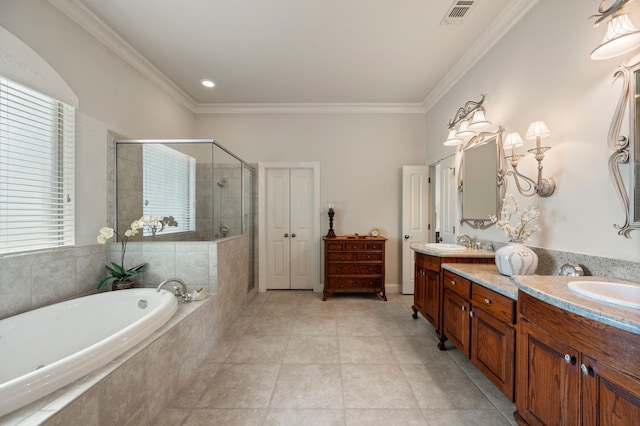 full bath featuring double vanity, a bath, visible vents, crown molding, and a shower stall