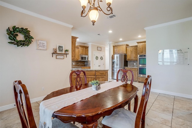 dining space with recessed lighting, baseboards, an inviting chandelier, and ornamental molding