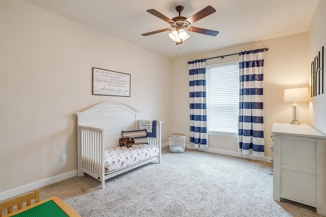 bedroom featuring baseboards, carpet flooring, and ceiling fan