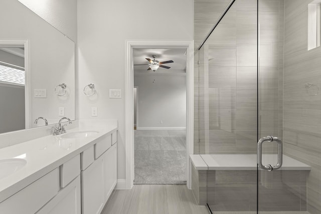 4327 Hudson St, Fate, TX 75087 - full bath featuring ceiling fan, a stall shower, double vanity, and baseboards