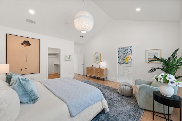 4401 El Campo Ave, Fort Worth, TX 76107 - bedroom with wood finished floors, a walk in closet, and high vaulted ceiling