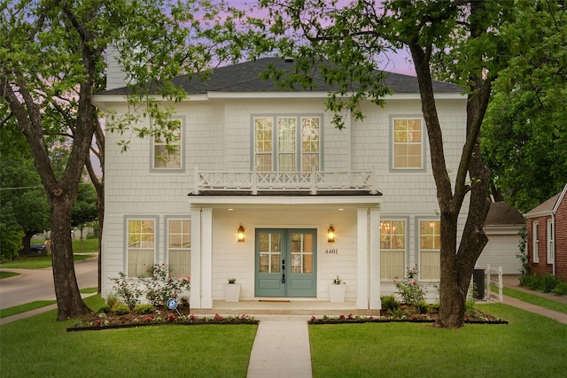 4401 El Campo Ave, Fort Worth, TX 76107 - view of front of house with french doors, a front yard, and central AC