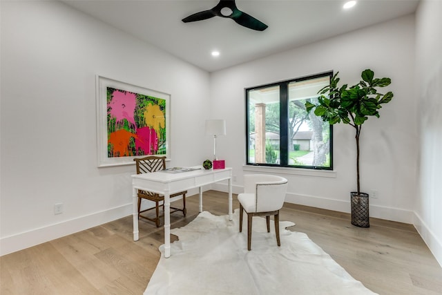 home office featuring baseboards, a ceiling fan, recessed lighting, and wood finished floors