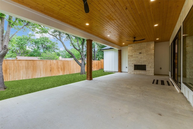 view of patio featuring a ceiling fan and fence private yard