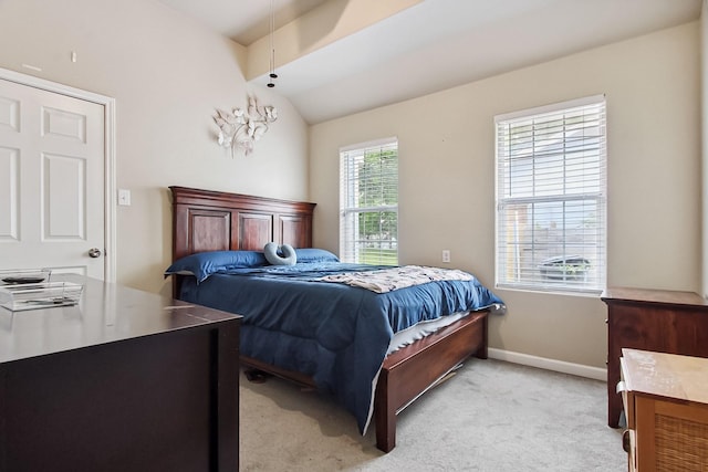 4713 Garrison Ave, Dallas, TX 75216 - bedroom featuring baseboards, light colored carpet, and lofted ceiling