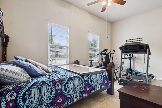 4713 Garrison Ave, Dallas, TX 75216 - tiled bedroom with a ceiling fan