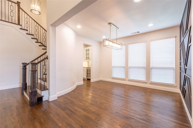 5521 Riverside Ln, Mckinney, TX 75070 - unfurnished dining area with stairway, recessed lighting, dark wood-style flooring, and visible vents