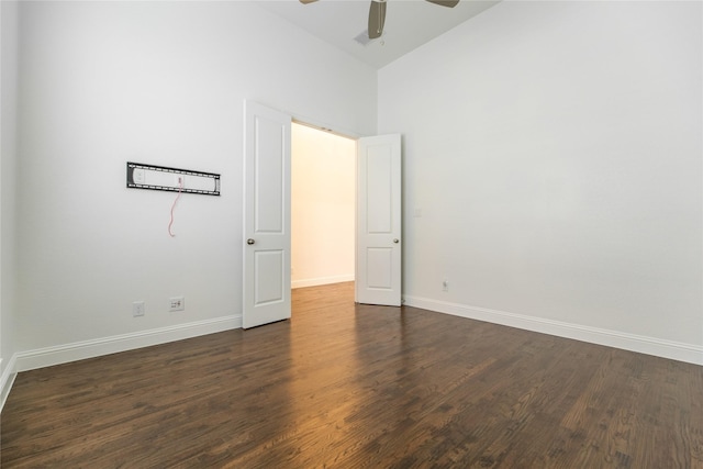 5521 Riverside Ln, Mckinney, TX 75070 - spare room featuring high vaulted ceiling, baseboards, a ceiling fan, and dark wood-type flooring