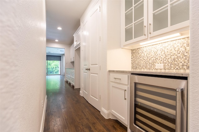 5521 Riverside Ln, Mckinney, TX 75070 - bar featuring decorative backsplash, a dry bar, wine cooler, recessed lighting, and dark wood-type flooring