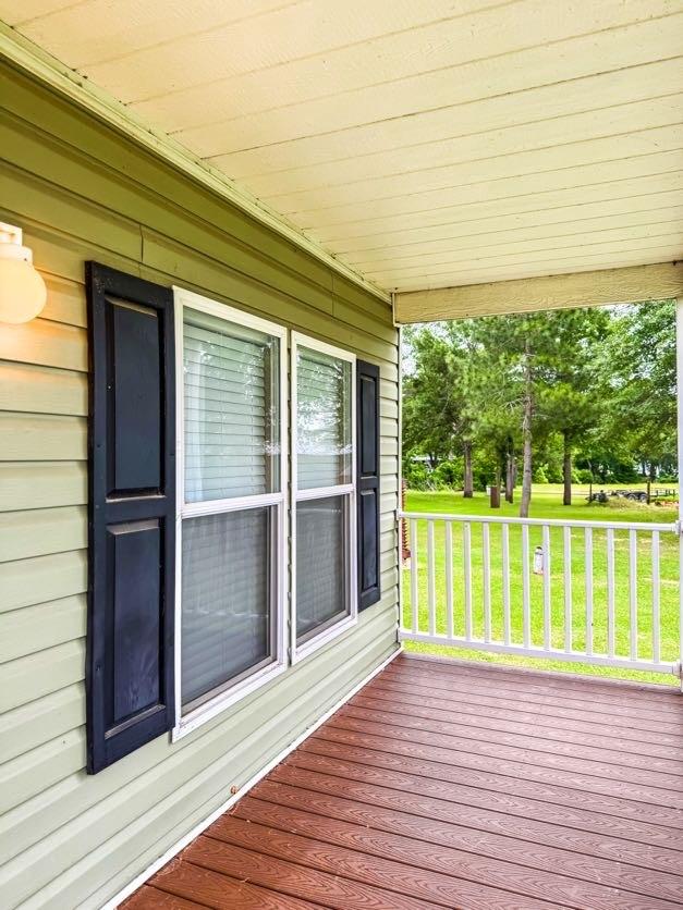 TBD County Road 891, Jewett, TX 75846 - wooden terrace featuring a lawn and covered porch