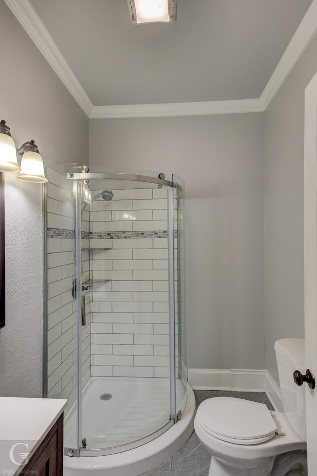 full bath featuring crown molding, a stall shower, toilet, and vanity