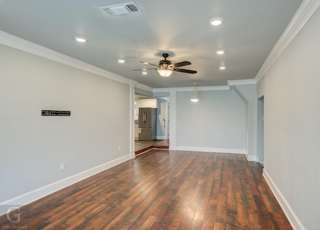 unfurnished room featuring visible vents, ornamental molding, ceiling fan, recessed lighting, and dark wood finished floors