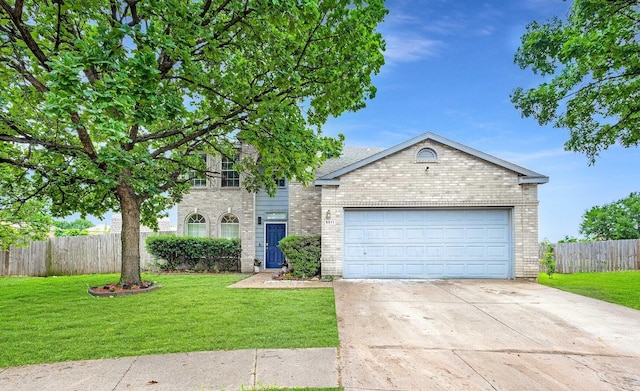 view of front of property with a front yard, a garage, brick siding, fence, and concrete driveway