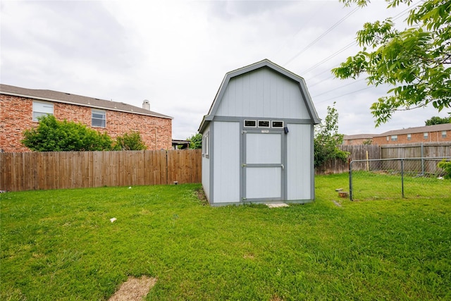 view of shed featuring a fenced backyard