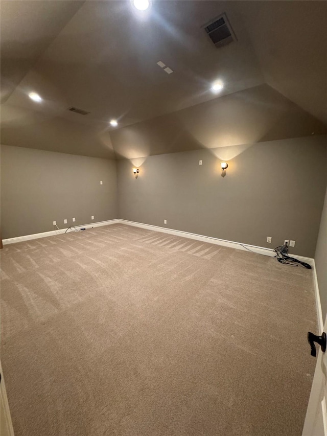 2823 Millington Dr, Highland Village, TX 75077 - carpeted spare room with lofted ceiling, baseboards, and recessed lighting