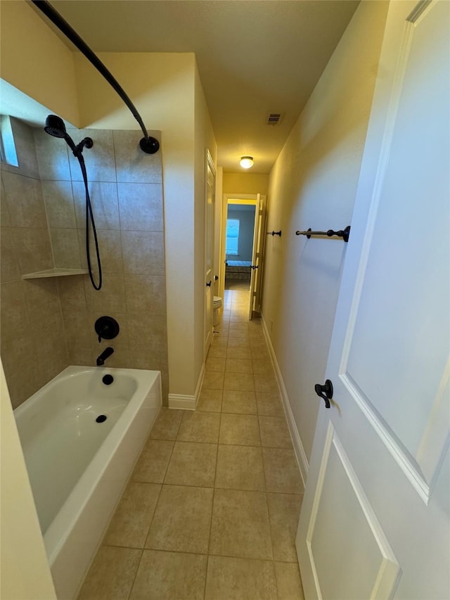 2823 Millington Dr, Highland Village, TX 75077 - full bath featuring tile patterned floors, shower / washtub combination, and baseboards
