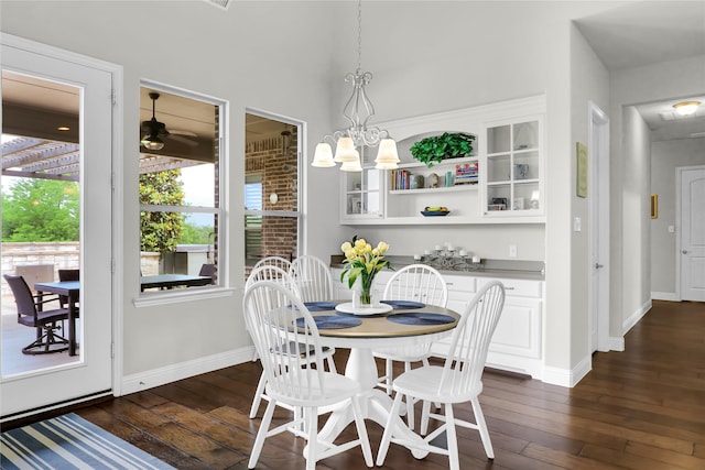 602 Limmerhill Dr, Rockwall, TX 75087 - dining room featuring baseboards and dark wood finished floors