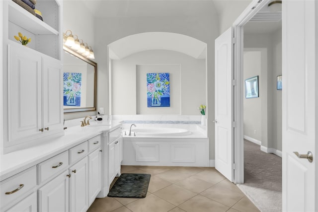 602 Limmerhill Dr, Rockwall, TX 75087 - full bathroom featuring tile patterned floors, a garden tub, and vanity