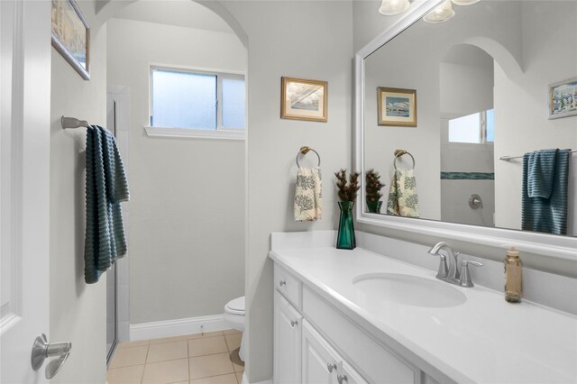 602 Limmerhill Dr, Rockwall, TX 75087 - full bathroom featuring tile patterned flooring, plenty of natural light, vanity, and toilet