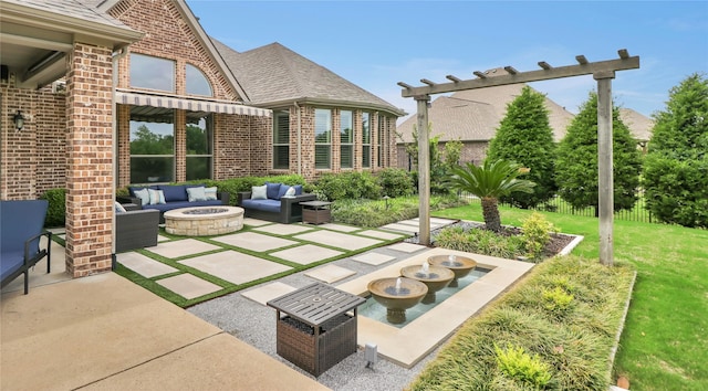 602 Limmerhill Dr, Rockwall, TX 75087 - view of patio with an outdoor living space with a fire pit