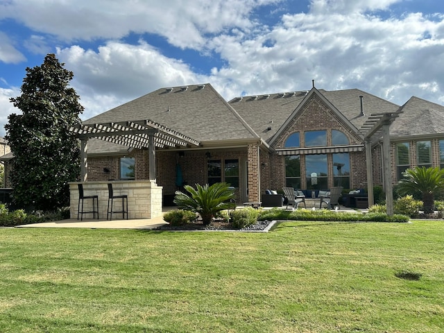 602 Limmerhill Dr, Rockwall, TX 75087 - back of house featuring an outdoor living space, outdoor dry bar, brick siding, and a patio